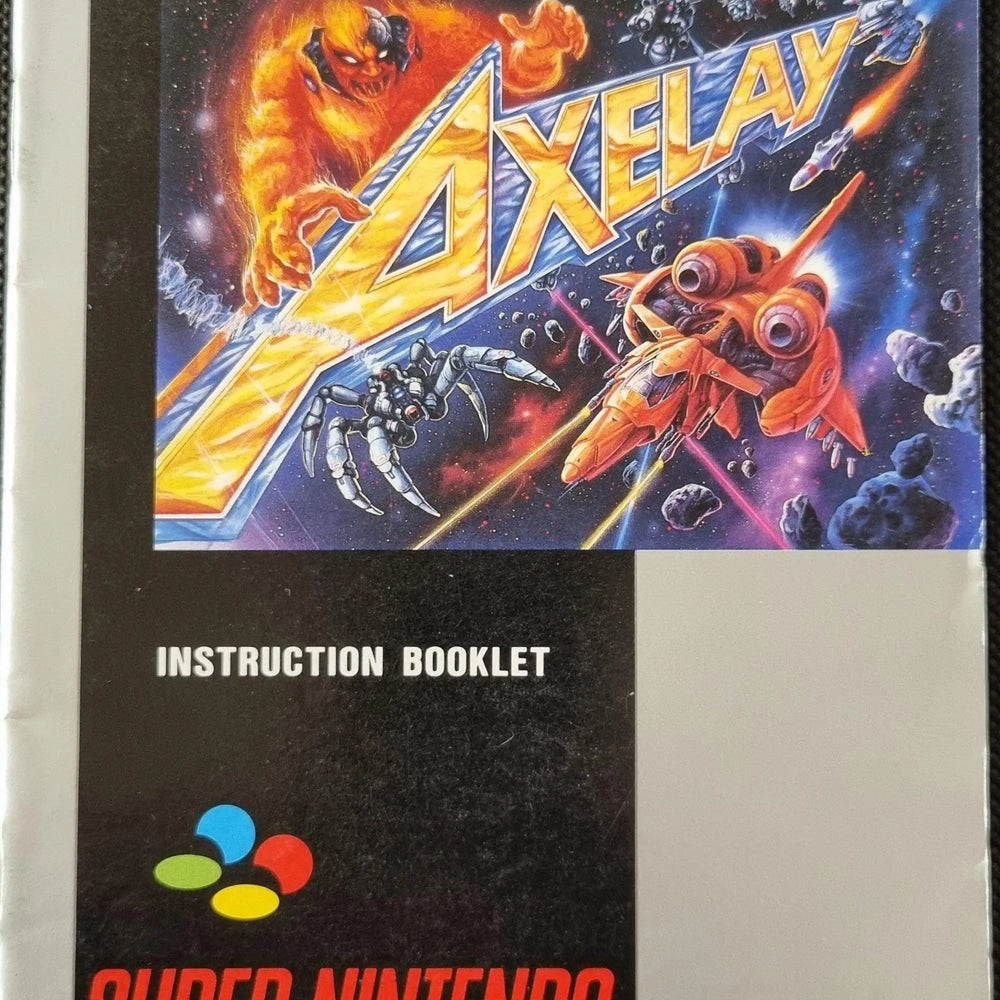 Axelay manual (SCN) - ZZGames.dk