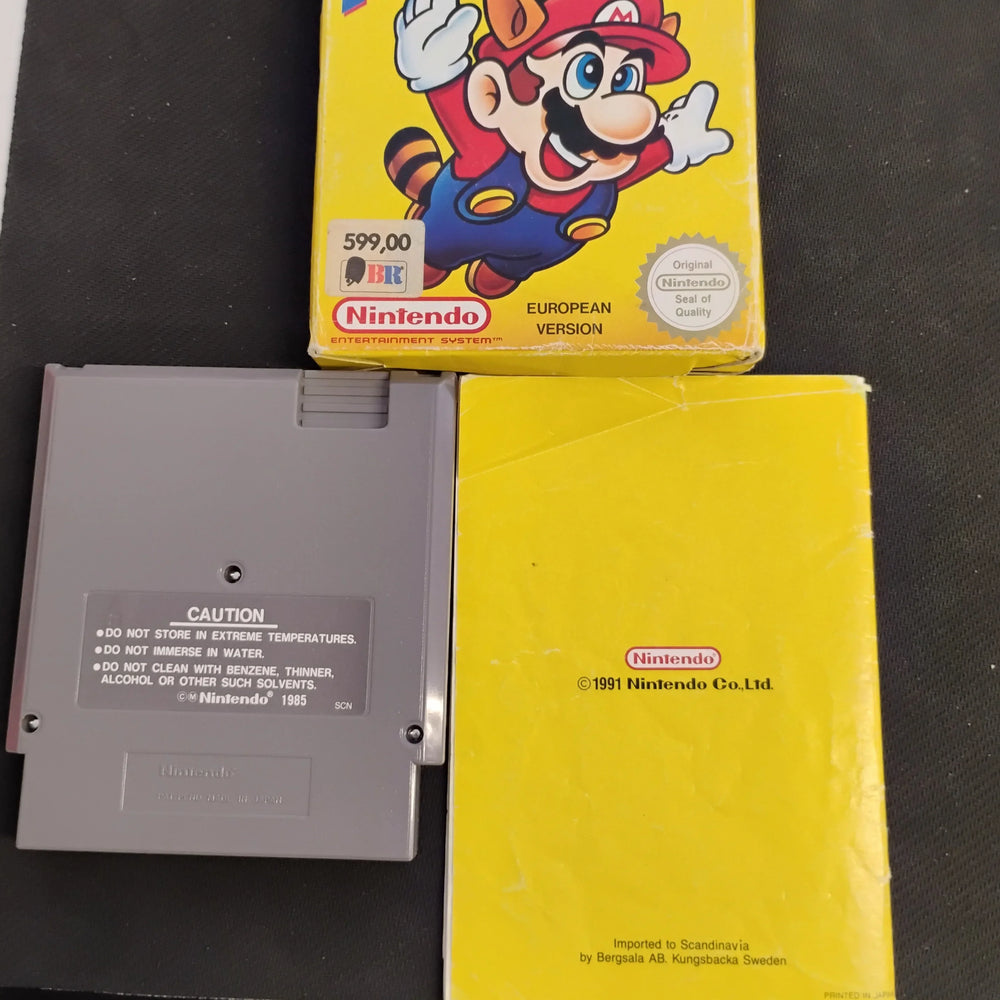 
                  
                    Super Mario Bros. 3 i æske (SCN)
                  
                