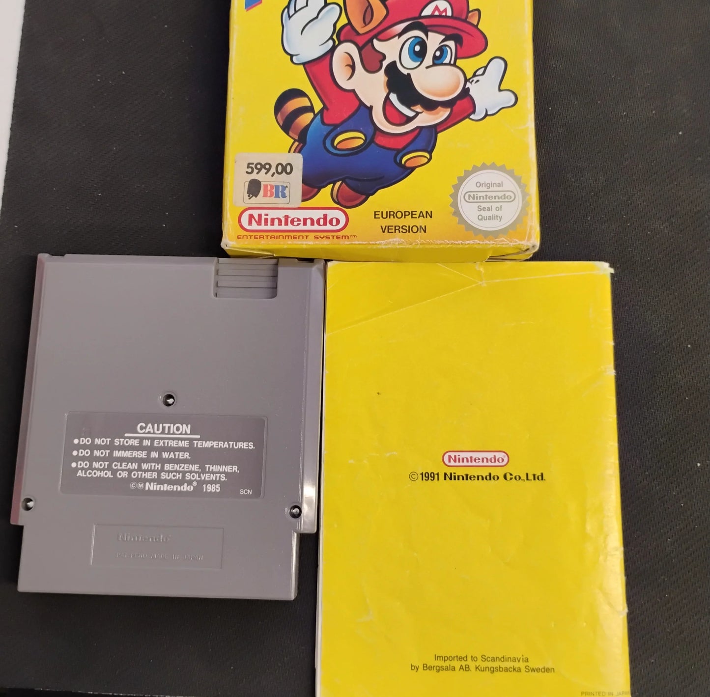 
                  
                    Super Mario Bros. 3 i æske (SCN)
                  
                