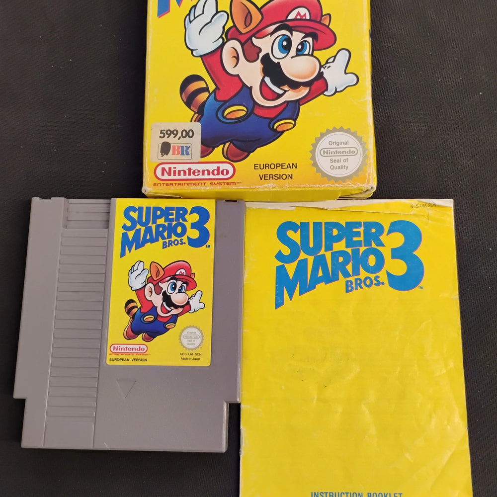 
                  
                    Super Mario Bros. 3 i æske (SCN)
                  
                